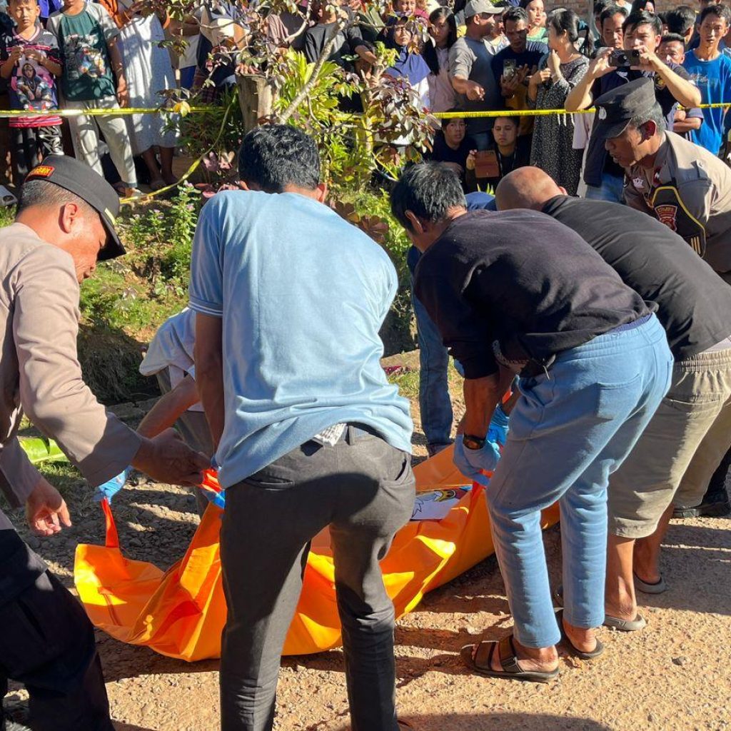 Rahan Randi bin Ruslan Abul Gani (31) ditemukan tewas di jalan desa tidak jauh dari rumah orang tuanya. Foto dokumen polisi